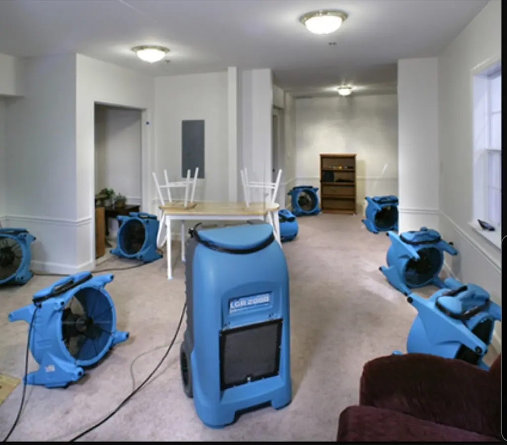 Air movers and dehumidifier setup for Water Damage Restoration in Cumberland